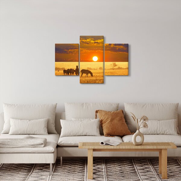 Obraz - Zebry so západom slnka (90x60 cm)