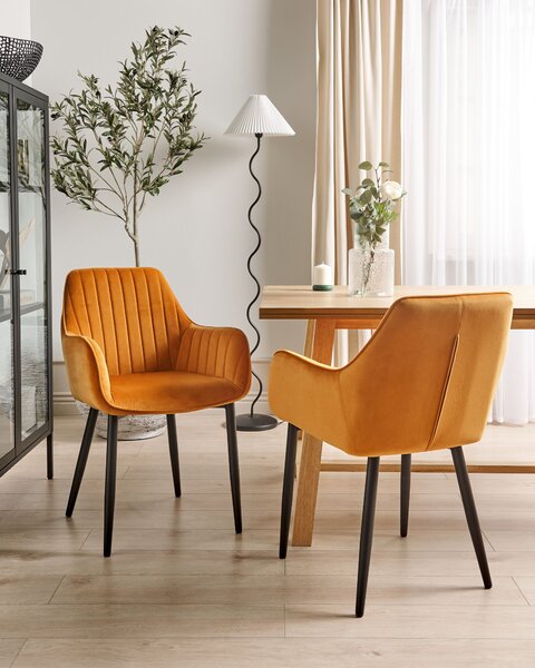 Sada 2 jedálenských stoličiek oranžová zamatová opierky rúk čierne kovové nohy retro glamour