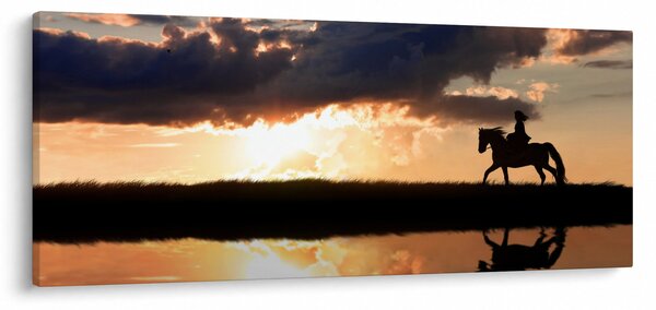Obraz - Jazdec na koni pri západe slnka (120x50 cm)