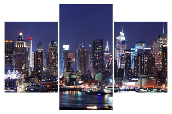 Obraz - Osvetlené New Yorské mrakodrapy (90x60 cm)