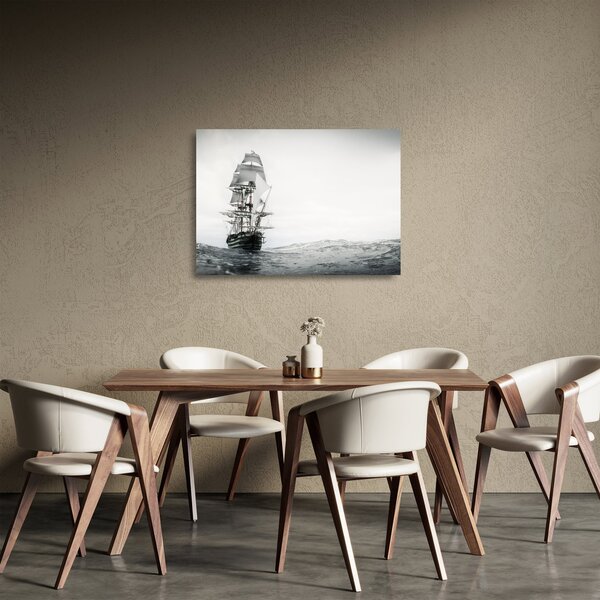 Sklenený obraz - Loď plávajúca po oceáne (70x50 cm)