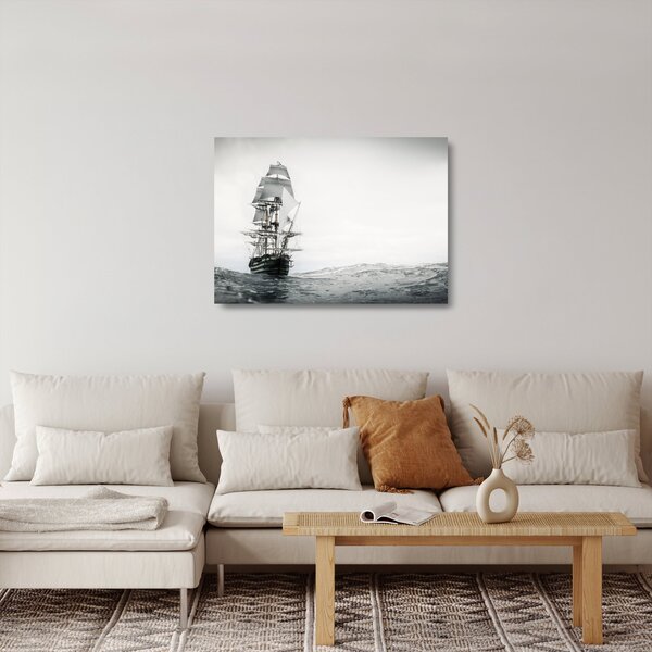 Sklenený obraz - Loď plávajúca po oceáne (70x50 cm)