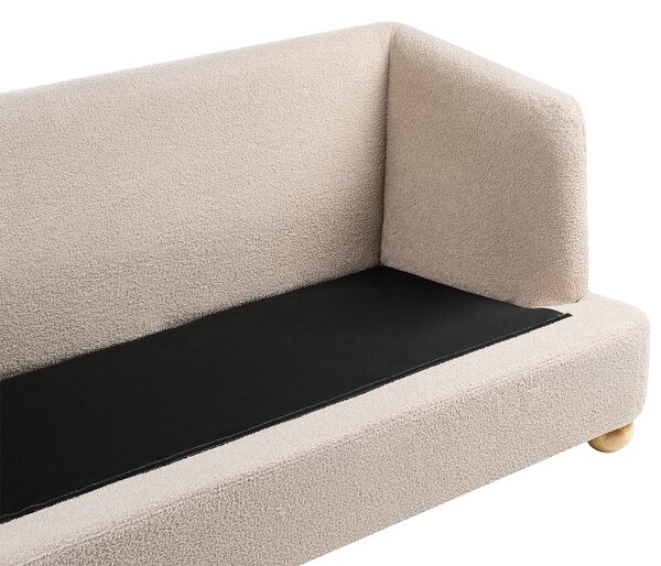 3-miestna pohovka béžová buklé čalúnenie guľaté drevené nohy bočné opierky obývacia izba moderný minimalistický štýl