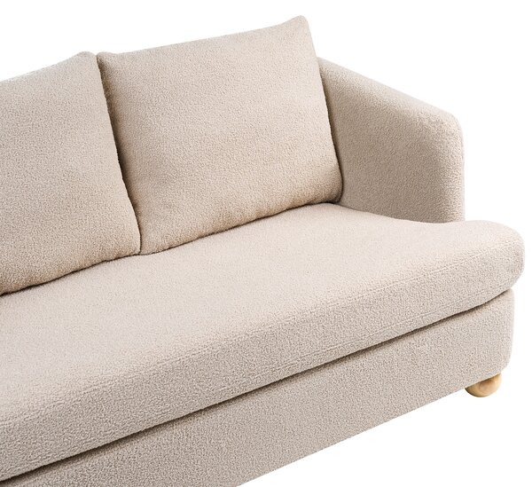 3-miestna pohovka béžová buklé čalúnenie guľaté drevené nohy bočné opierky obývacia izba moderný minimalistický štýl