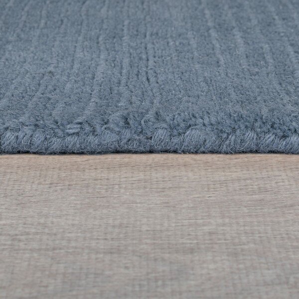 Tmavomodrý ručne tkaný vlnený koberec 120x170 cm Textured Wool Border – Flair Rugs
