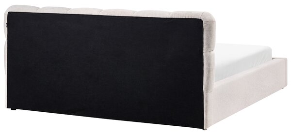 Posteľ svetlobéžová látkové čalúnenie 180 x 200 cm s úložným priestorom s čelom lamelový rošt moderný štýl spálňa