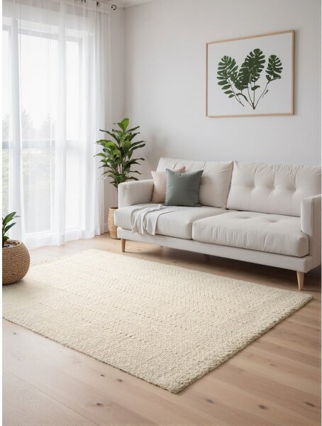 Krémový/slonovinový ručne tkaný koberec s prímesou vlny 80x150 cm Majoli – Elle Decoration