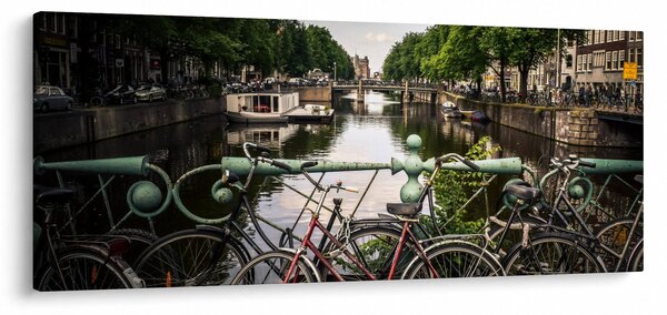 Obraz bicykla v meste (120x50 cm)