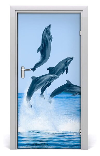 Fototapeta samolepiace na dvere skákajúci delfíny 95x205 cm