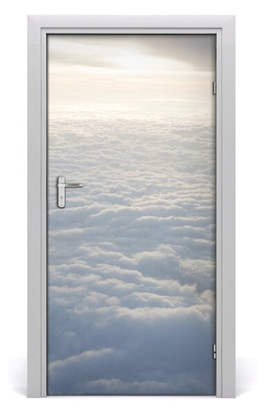 Fototapeta na dvere let nad oblaky 95x205 cm