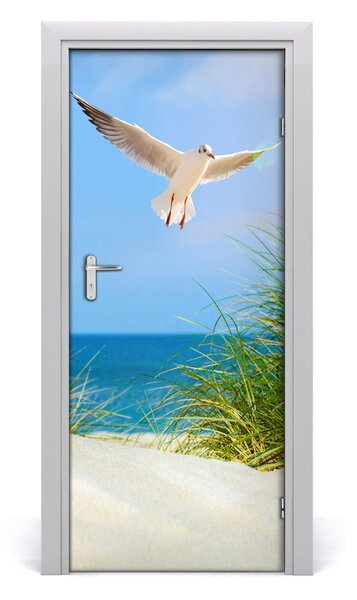 Fototapeta na dvere samolepiace Meva nad dunami 85x205 cm