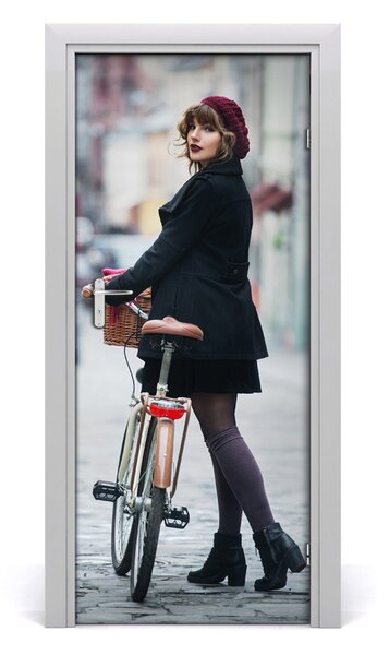 Fototapeta samolepiace dvere žena na bicykli 85x205 cm