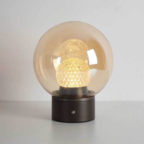 Searchlight Stolová LED lampa Solis s akumulátorom, bronzová, sklo, 2 700 K, Krémová / jantárovo žltá, Obývacia izba / jedáleň, kov, Stojacie svietidlo