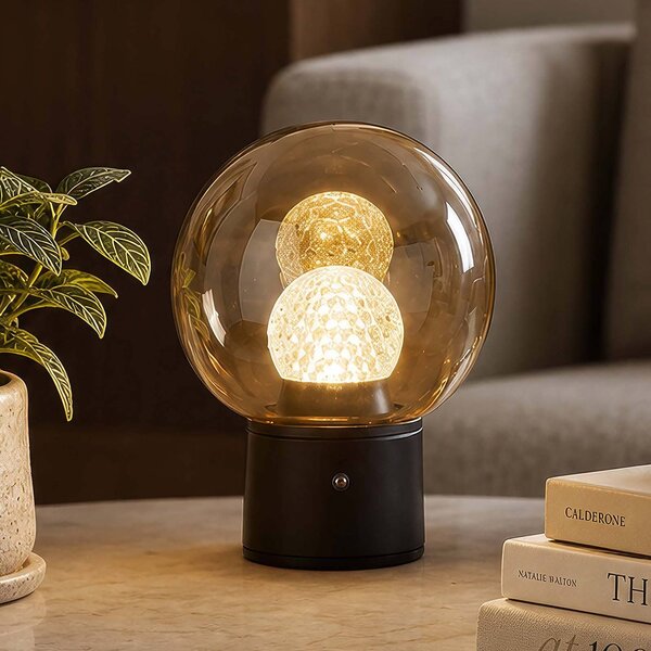 Searchlight Stolová LED lampa Solis s akumulátorom, bronzová, sklo, 2 700 K, Krémová / jantárovo žltá, Obývacia izba / jedáleň, kov, Stojacie svietidlo