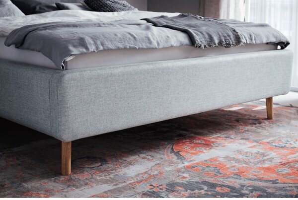 Sivomodrá čalúnená dvojlôžková posteľ s úložným priestorom s roštom 180x200 cm Lotte – Meise Möbel