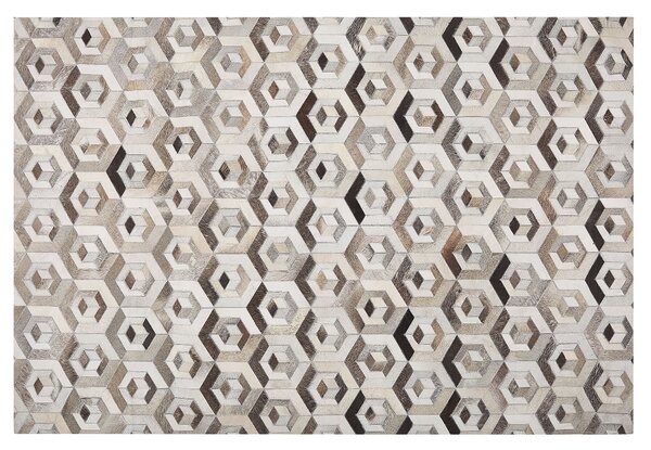 Obdĺžnikový koberec béžová a hnedá hovädzia koža 140 x 200 cm patchwork geometrický vzor retro