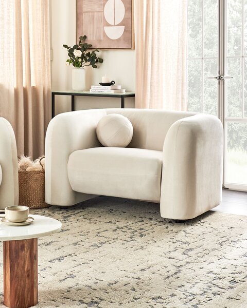 Kreslo krémová biela zamatové čalúnenie okrúhly vankúš retro glamour art deco štýl obývačka spálňa