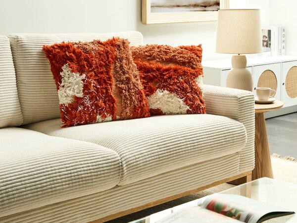 Sada 2 dekoratívnych vankúšov oranžová bavlnené obliečky polyester 45 x 45 cm všívaný vzor štvorcové vankúše