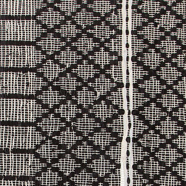 Koberec čierny a béžový pravá koža 140 x 200 cm nízky vlas geometrický vzor ručne obdĺžnikový