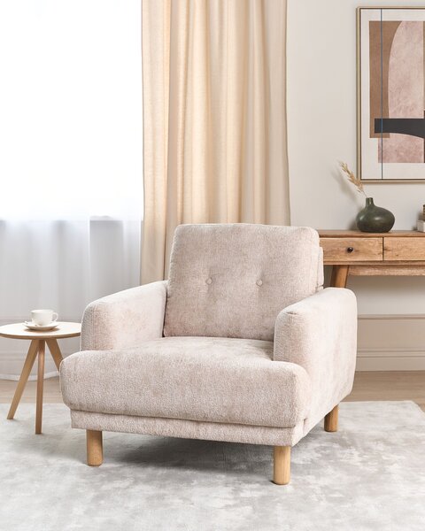 Kreslo béžové buklé čalúnenie drevené nohy minimalistický retro štýl obývacia izba