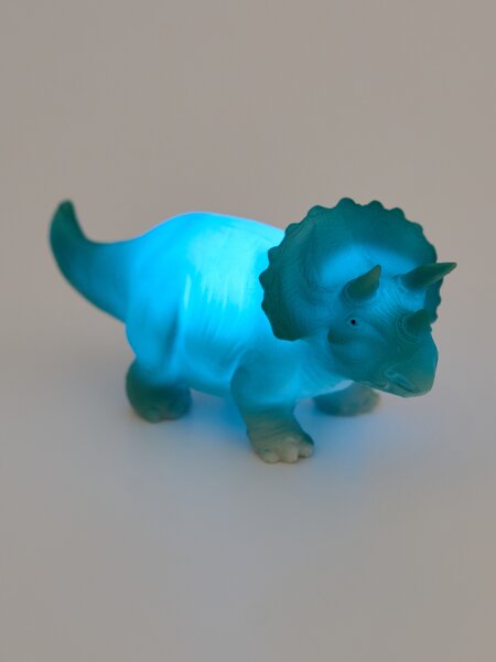 Sinsay - Detská nočná LED lampička v tvare dinosaura - svetlomodrá