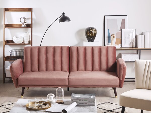 Rozkladacia pohovka ružová zamatové čalúnenie vhodná na spanie elegantná moderná obývacia izba spálňa