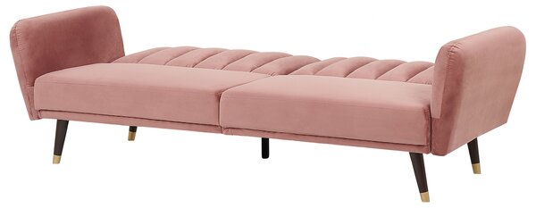 Rozkladacia pohovka ružová zamatové čalúnenie vhodná na spanie elegantná moderná obývacia izba spálňa
