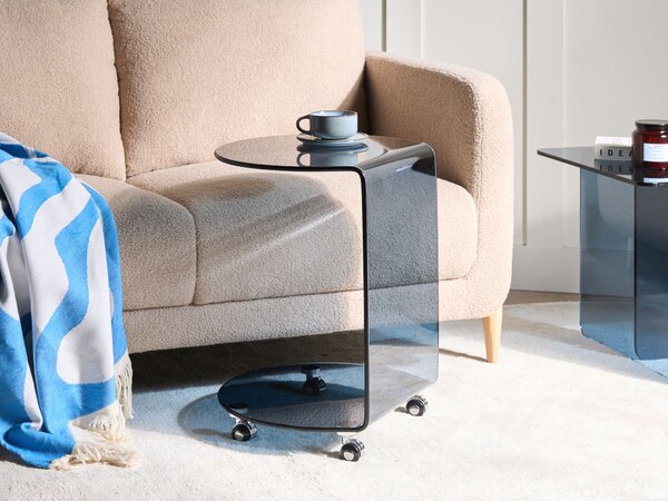 Odkladací stolík modrý tvrdené sklo 57 x 45 cm s kolieskami tvar písmena C moderný minimalistický štýl obývacia izba