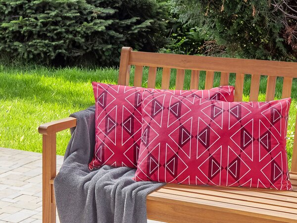 Sada 2 záhradných vankúšov ružová polyester geometrický vzor 40 x 60 cm obdĺžniková moderný štýl vonkajšia terasa vodoodolná