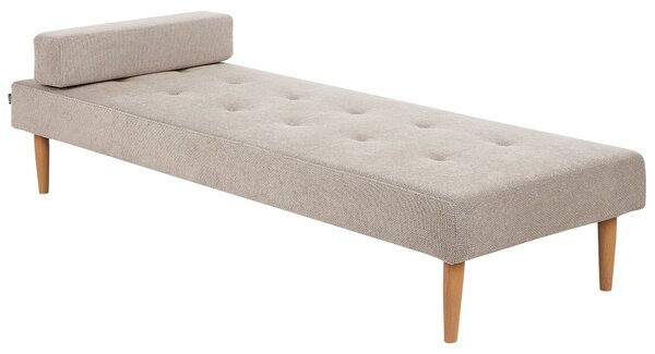Leňoška béžová látková čalúnená drevené nohy podhlavník moderný minimalistický dizajn