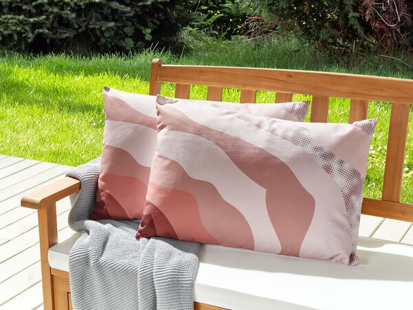 Sada 2 záhradných vankúšov ružová polyester 40 x 60 cm abstraktný vzor moderný štýl vonkajšie dekorácie vodoodolné