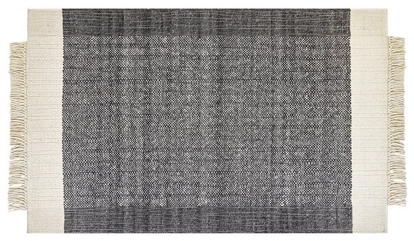 Koberec čierna a krémová biela 140 x 200 cm obdĺžnikový ručne tkaný so strapcami moderný dizajn