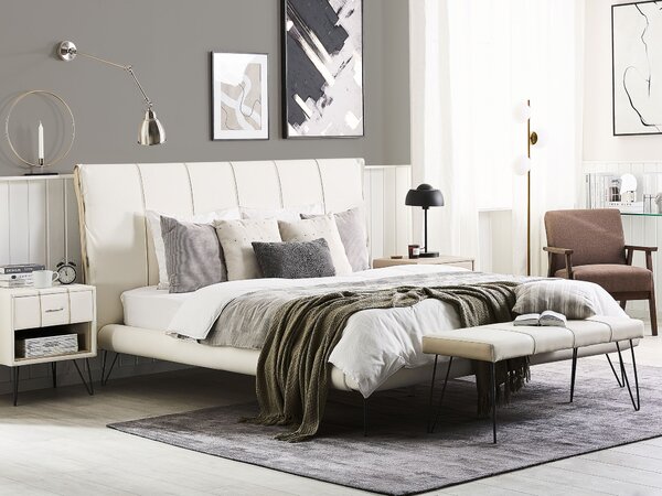 Posteľ svetlobéžová umelá koža 160 x 200 cm prešívané čelo postele tenké čierne nohy moderný dizajn