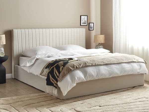 Posteľ s úložným priestorom béžový polyester 180 x 200 cm vysoké prešívané čelo nábytok do spálne