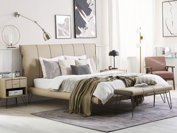 Posteľ béžová umelá koža 180 x 200 cm prešívané čelo postele tenké čierne nohy moderný dizajn