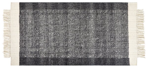 Koberec čierna a krémová biela 80 x 150 cm obdĺžnikový ručne tkaný so strapcami moderný dizajn