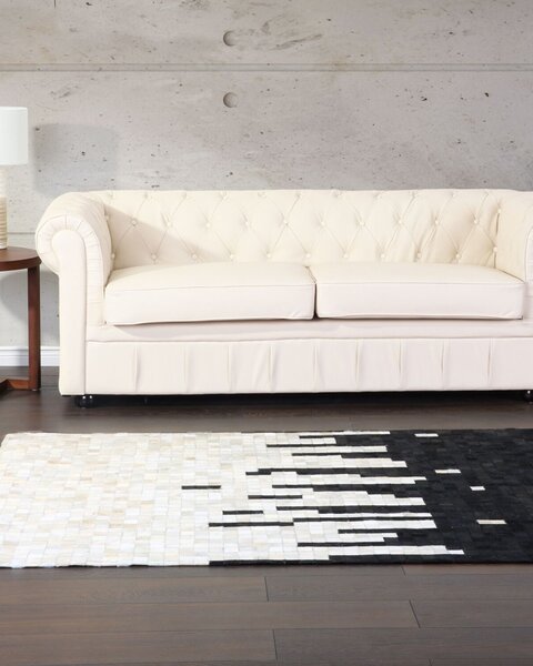 Koberec čierno-biely kožený 160 x 230 cm pravá hovädzia koža abstraktný patchworkový obdĺžnikový moderný