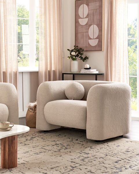 Kreslo béžové buklé čalúnenie okrúhly vankúš retro glamour art deco štýl obývačka spálňa