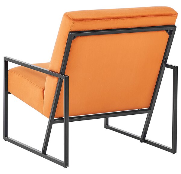 Kreslo oranžové zamatové čalúnené čierny železný rám moderná elegantná obývacia izba
