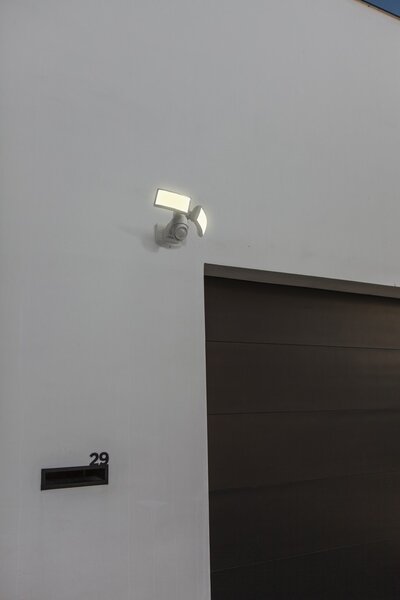 Lutec 7632201053 LED vonkajší nástenný reflektor so senzorom Arc 1x19W | 5000K | IP54 - 2 nastaviteľné hlavy