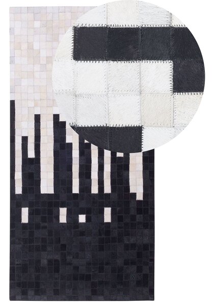 Koberec čierno-biely kožený 80 x 150 cm pravá hovädzia koža abstraktný patchworkový obdĺžnikový moderný