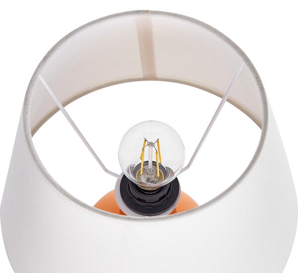 Stolná lampa oranžová keramický podstavec ľanové tienidlo v tvare bubna minimalistický dizajn