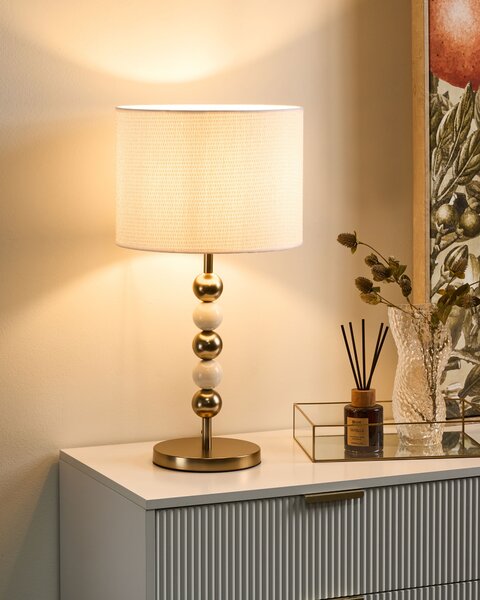 Stolná lampa mosadzná a béžová železný podstavec biele tienidlo mid-century modern štýl obývacia izba spálňa