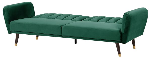 Rozkladacia pohovka smaragdovozelená zamatové čalúnenie vhodná na spanie elegantná moderná obývacia izba spálňa