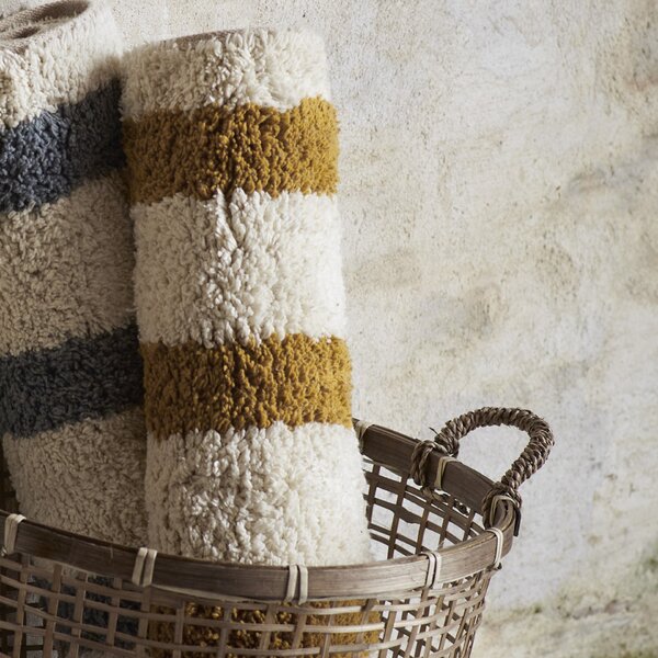 Kúpeľňová rohožka Tufted Mustard Stripe 50 × 80 cm