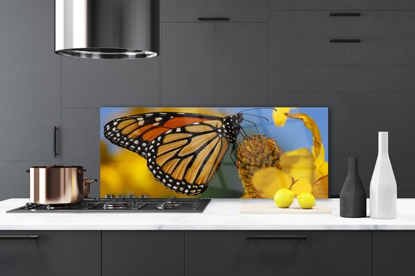 Sklenený obklad Do kuchyne Motýľ kvet príroda 125x50 cm