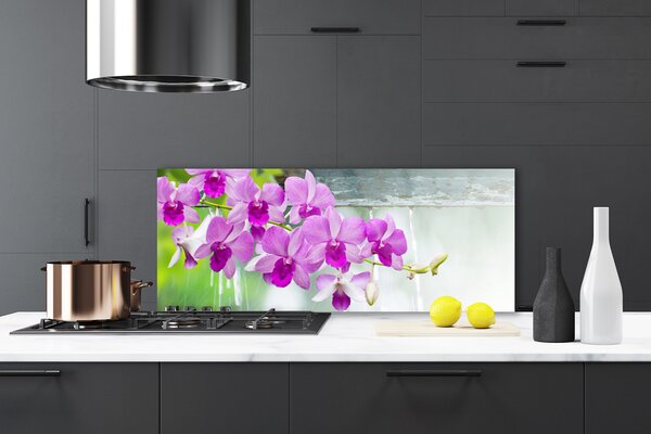 Sklenený obklad Do kuchyne Orchidey kvapky príroda 125x50 cm