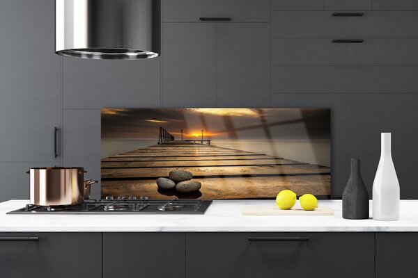 Sklenený obklad Do kuchyne More mólo západ slnka 125x50 cm
