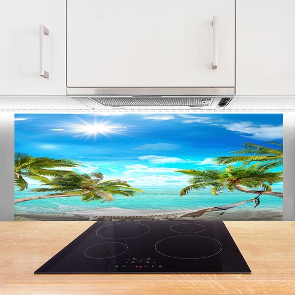 Sklenený obklad Do kuchyne Tropické palmy hamaka pláž 125x50 cm
