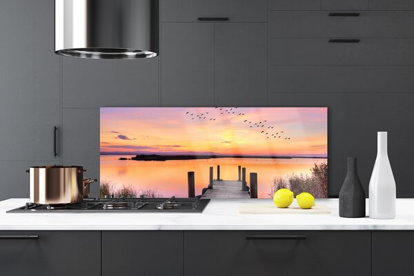 Sklenený obklad Do kuchyne Mólo západ slnka jazero 125x50 cm